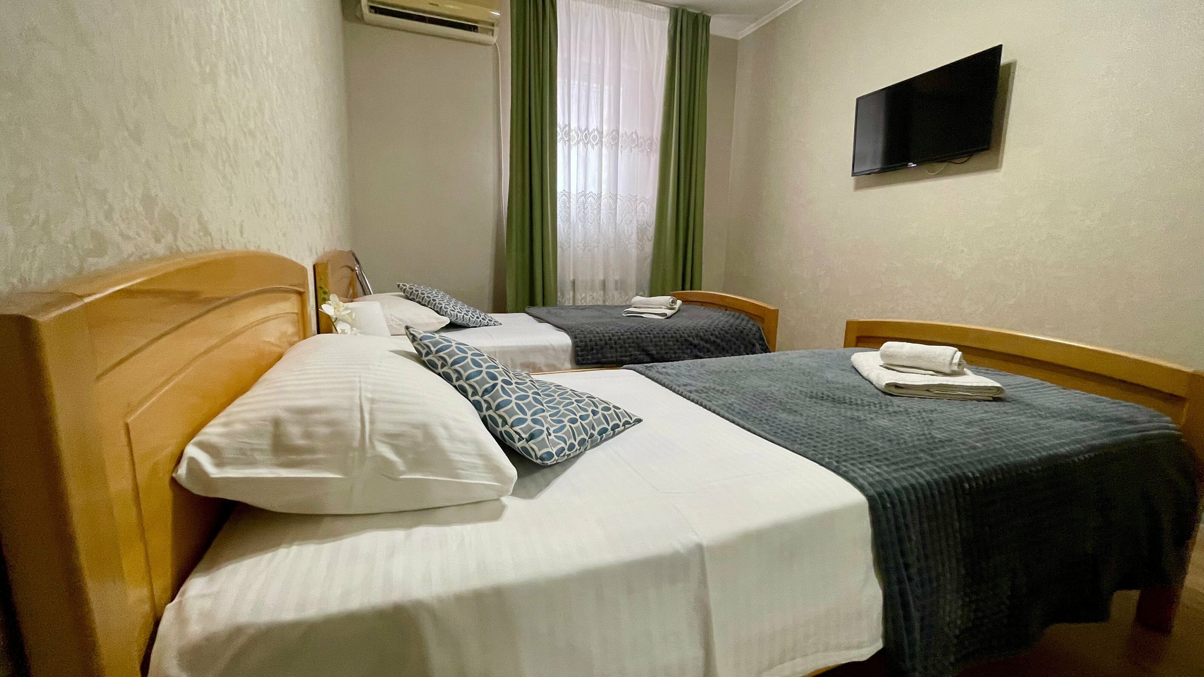 Двухместный номер эконом-класса с 2 отдельными кроватями
