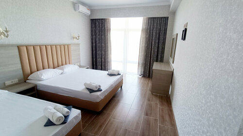 Роскошный четырехместный номер в Санторини