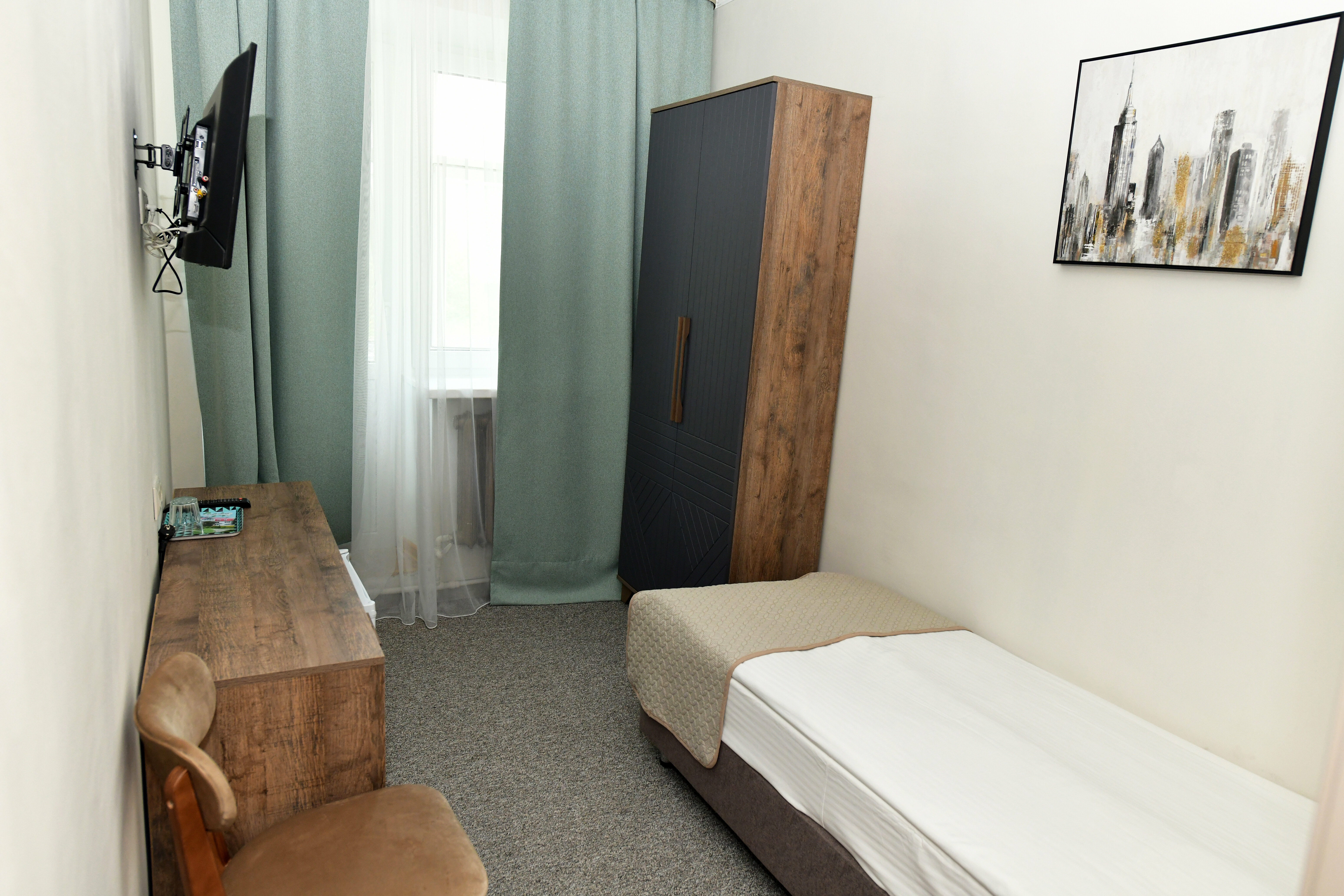 Одноместный номер с общим душем и туалетом