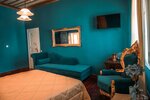 Двухместный номер «Делюкс» с 1 двуспальной кроватью в Ilion Hotel Suites