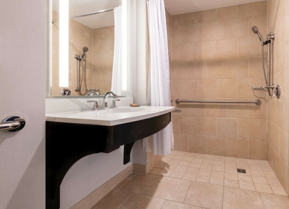 executive 2-room suite,1king bed with one sofabed,business lounge access(mobility & hearing, roll-in