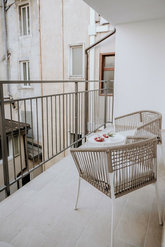 Family Quadruple Room, Balcony, Courtyard View