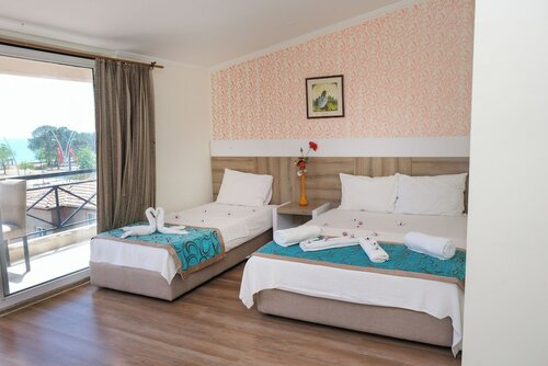 Стандартный двухместный номер с 1 или 2 кроватями, частичный вид на море в Beldibi Beach Hotel