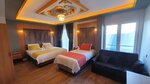 Трехместный номер «Делюкс» в Dimora Gold Hotel