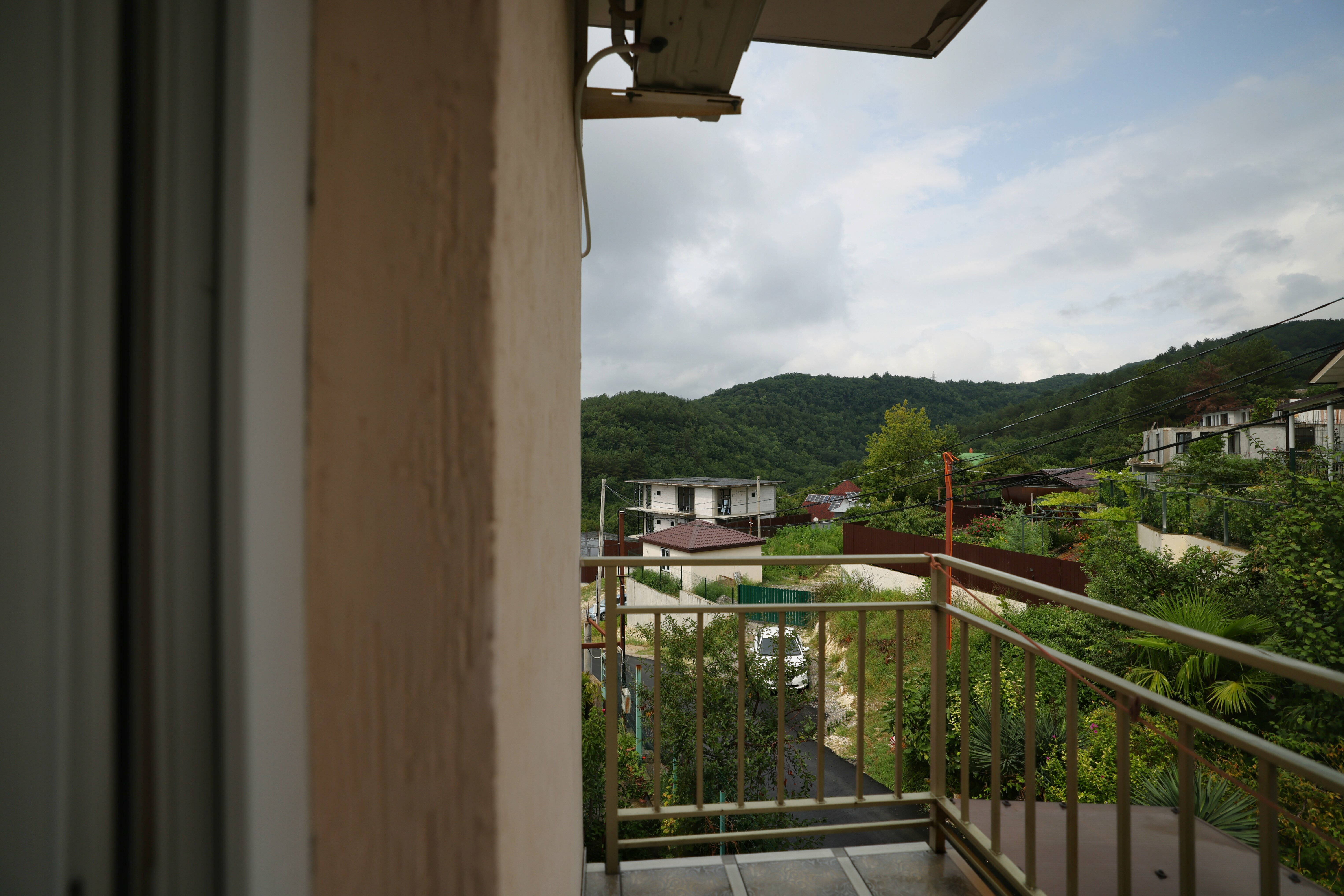 Трехместный номер с доп. местом с балконом и видом на горы