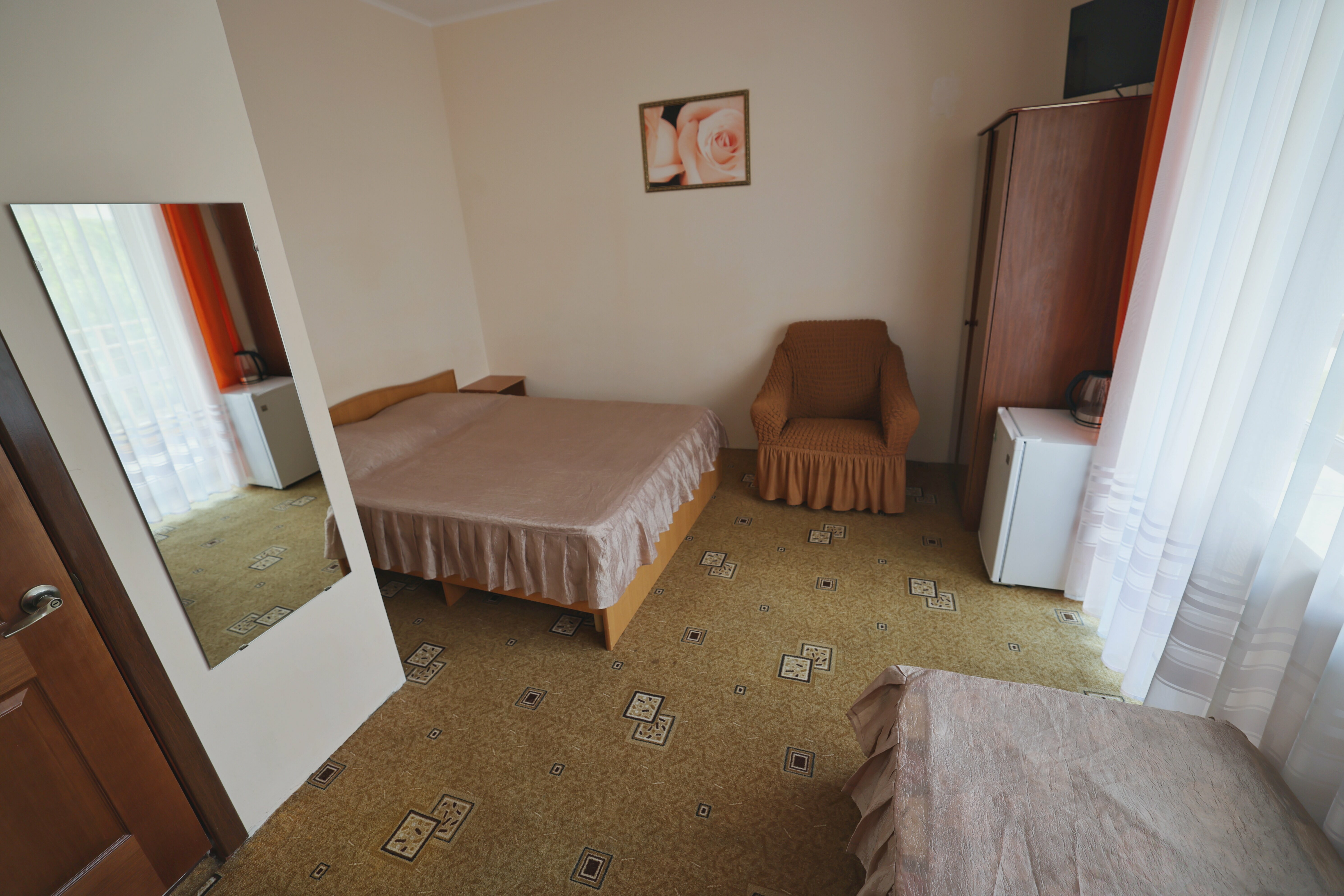 Трехместный номер с доп. местом с балконом и видом на горы