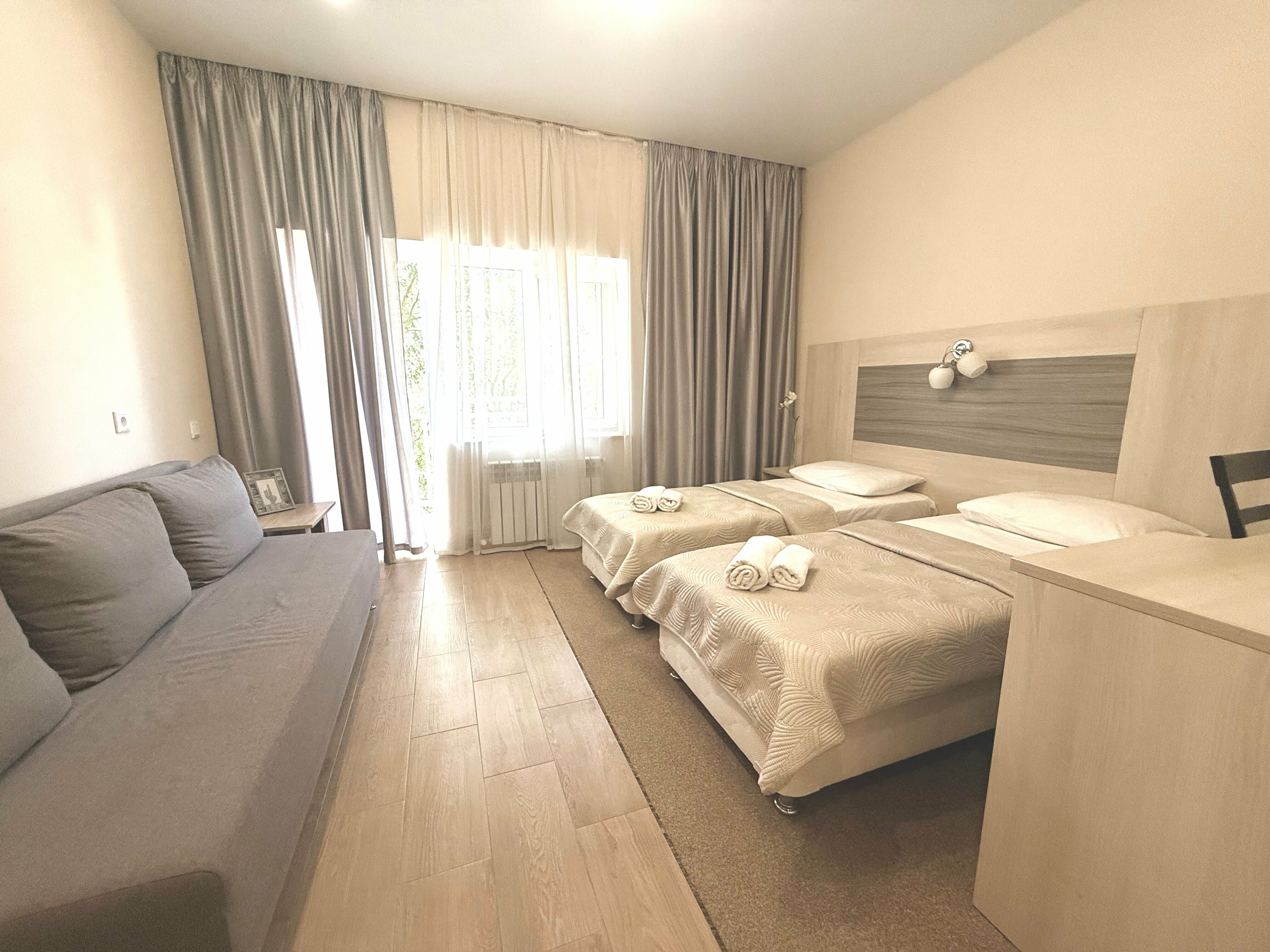 Улучшенный четырехместный номер