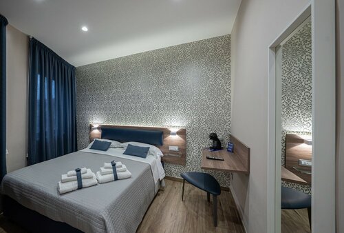 Улучшенный двухместный номер с 1 двуспальной кроватью (Porta San Gennaro) в Famalu Apartments