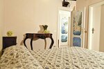 Номер «Комфорт», вид на сад в Leonardo's B&b