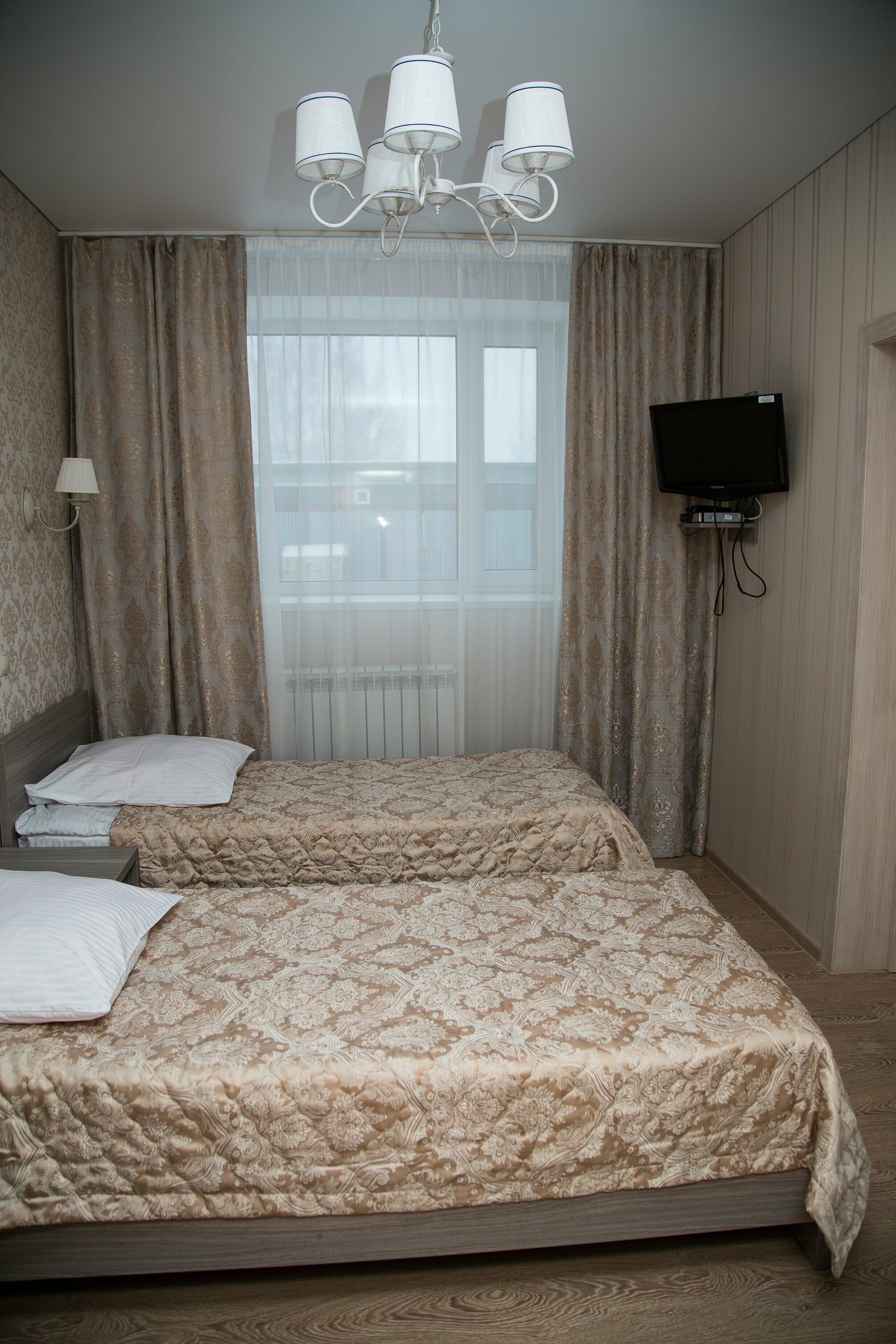 Улучшенный двухместный номер с двумя кроватями