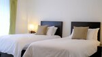 Стандартный двухместный номер с 2 односпальными кроватями в Nara Residence Trang