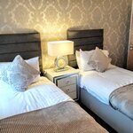 Двухместный номер «Делюкс» с 2 односпальными кроватями, смежные ванная комната и спальня в Angel House Bed & Breakfast