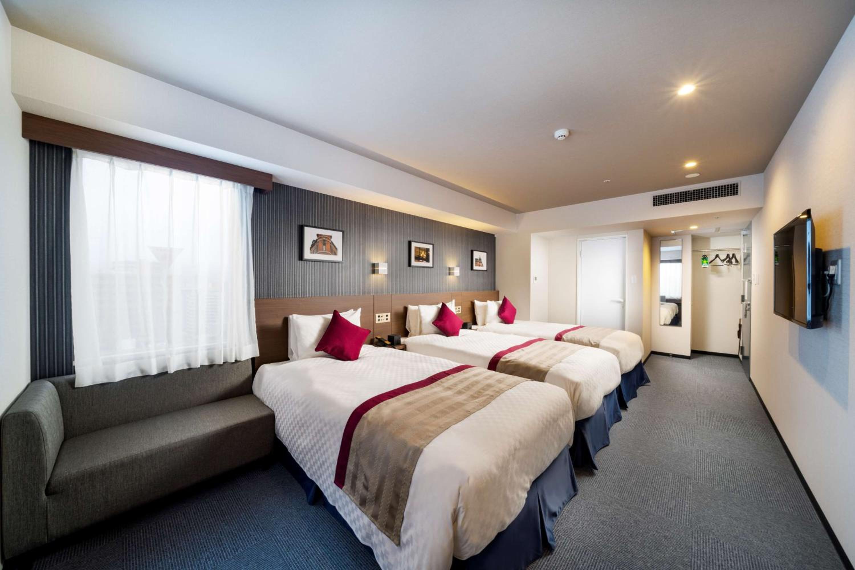 Triple Room with Three Single Beds