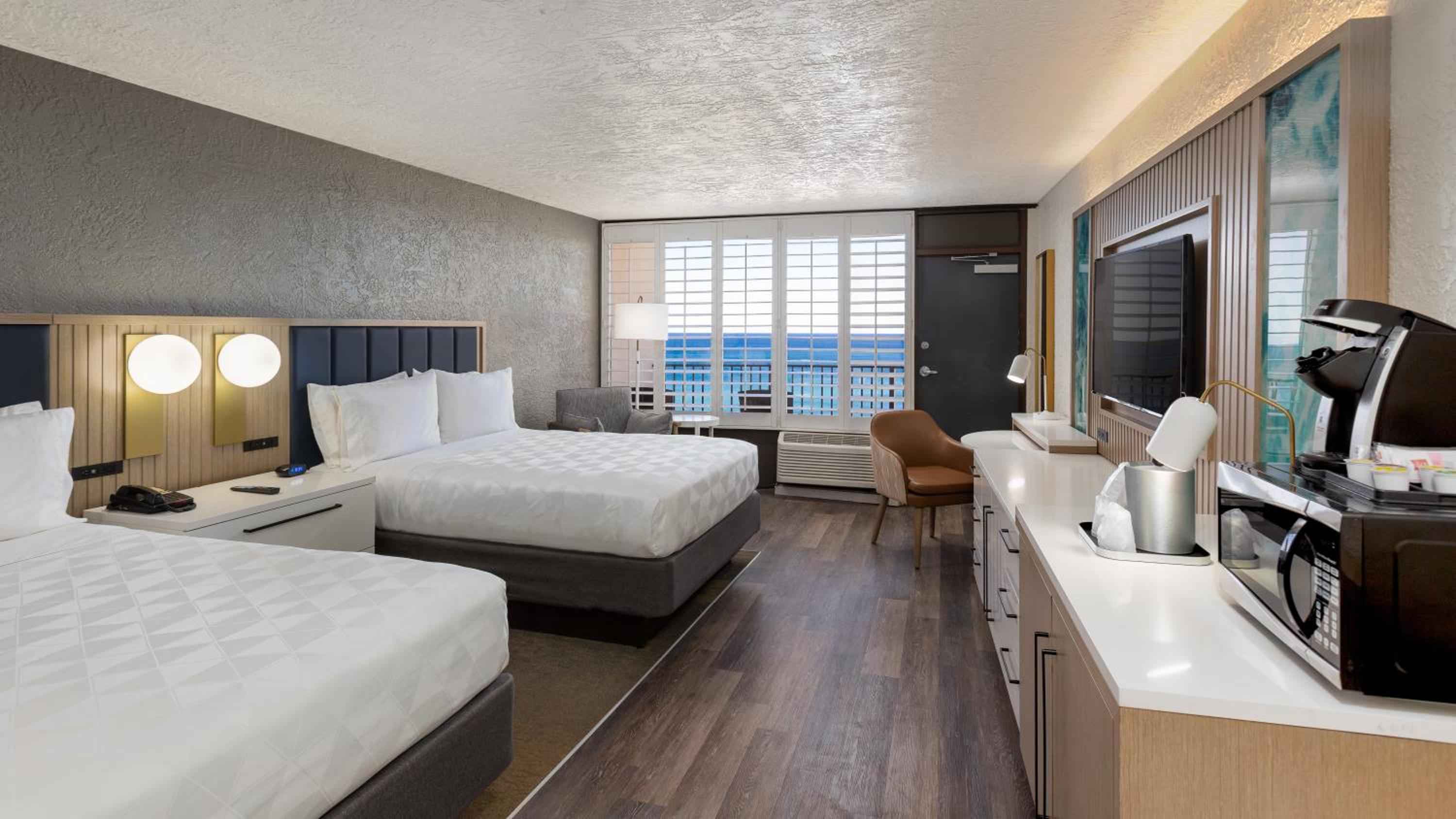 Queen Room with Two Queen Beds Hearing Accessible with Roll-In Shower - Non-Smoking