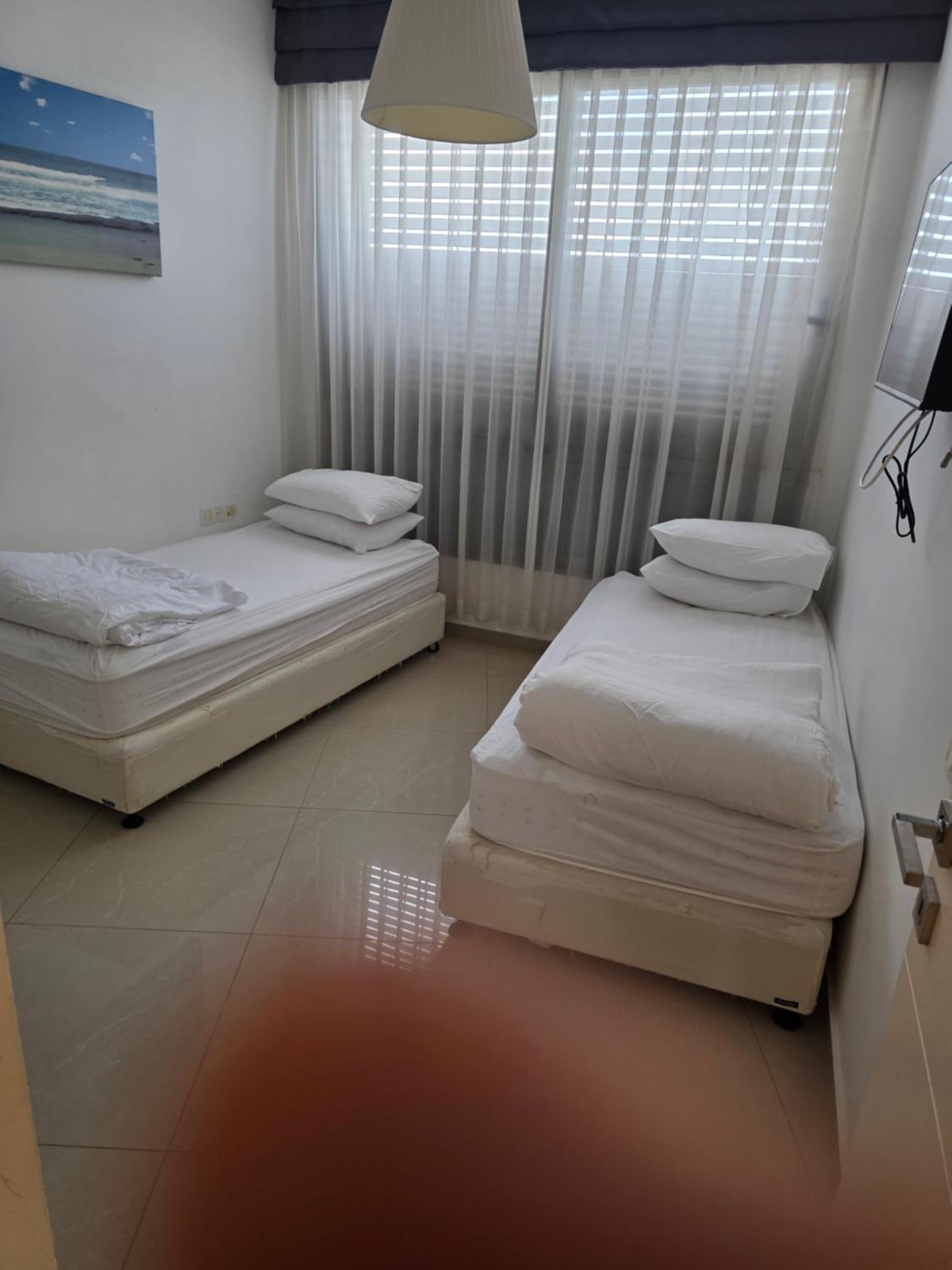 Three-Bedroom Apartment with Sea View