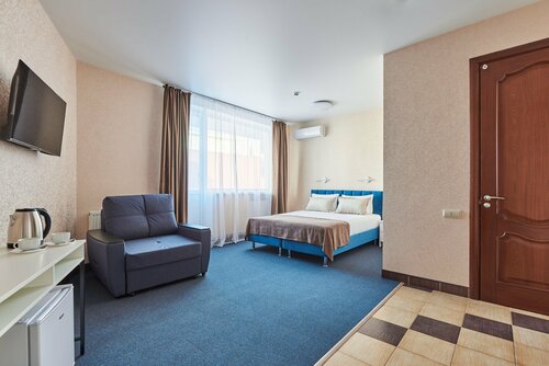 Трехместный номер с балконом