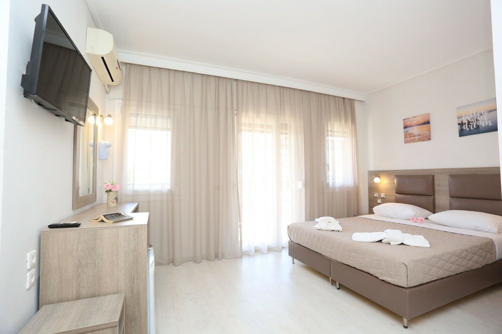 Triple Room (extra bed 4 persons)