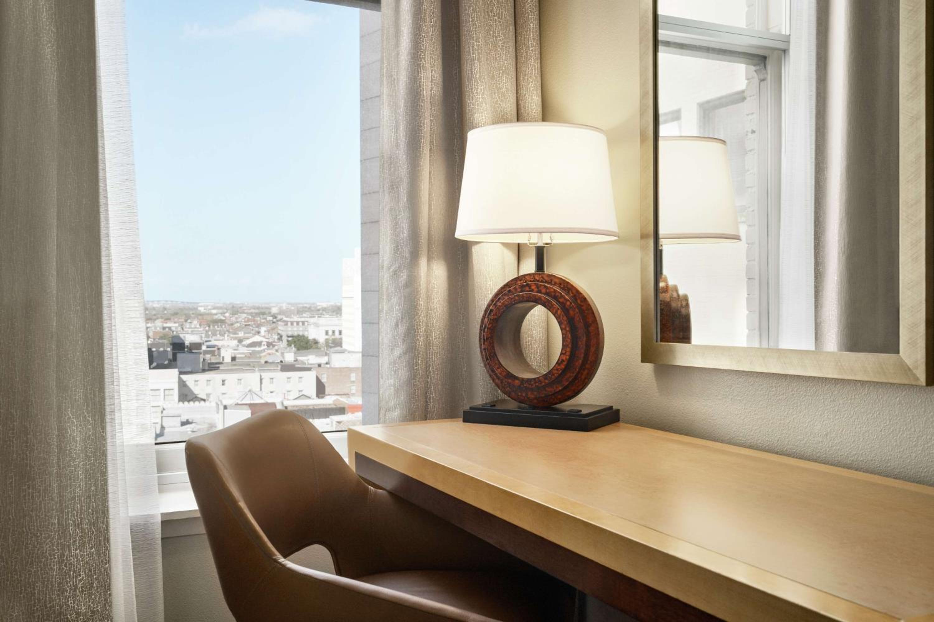 Corner Queen Room with Two Queen Beds and Sofa Bed