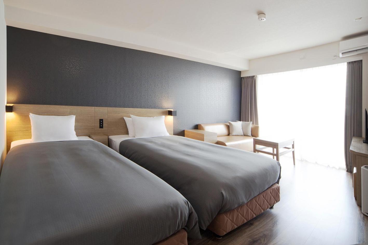 Deluxe Twin Room with Sofa bed and Balcony - North Wing