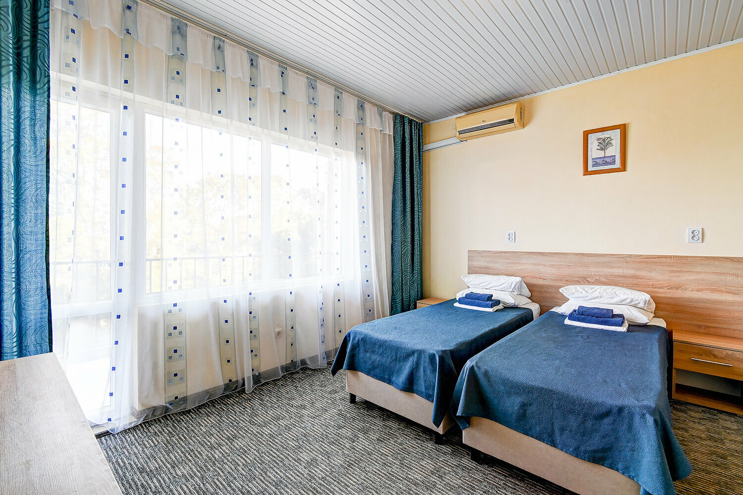 Трехместный номер с балконом