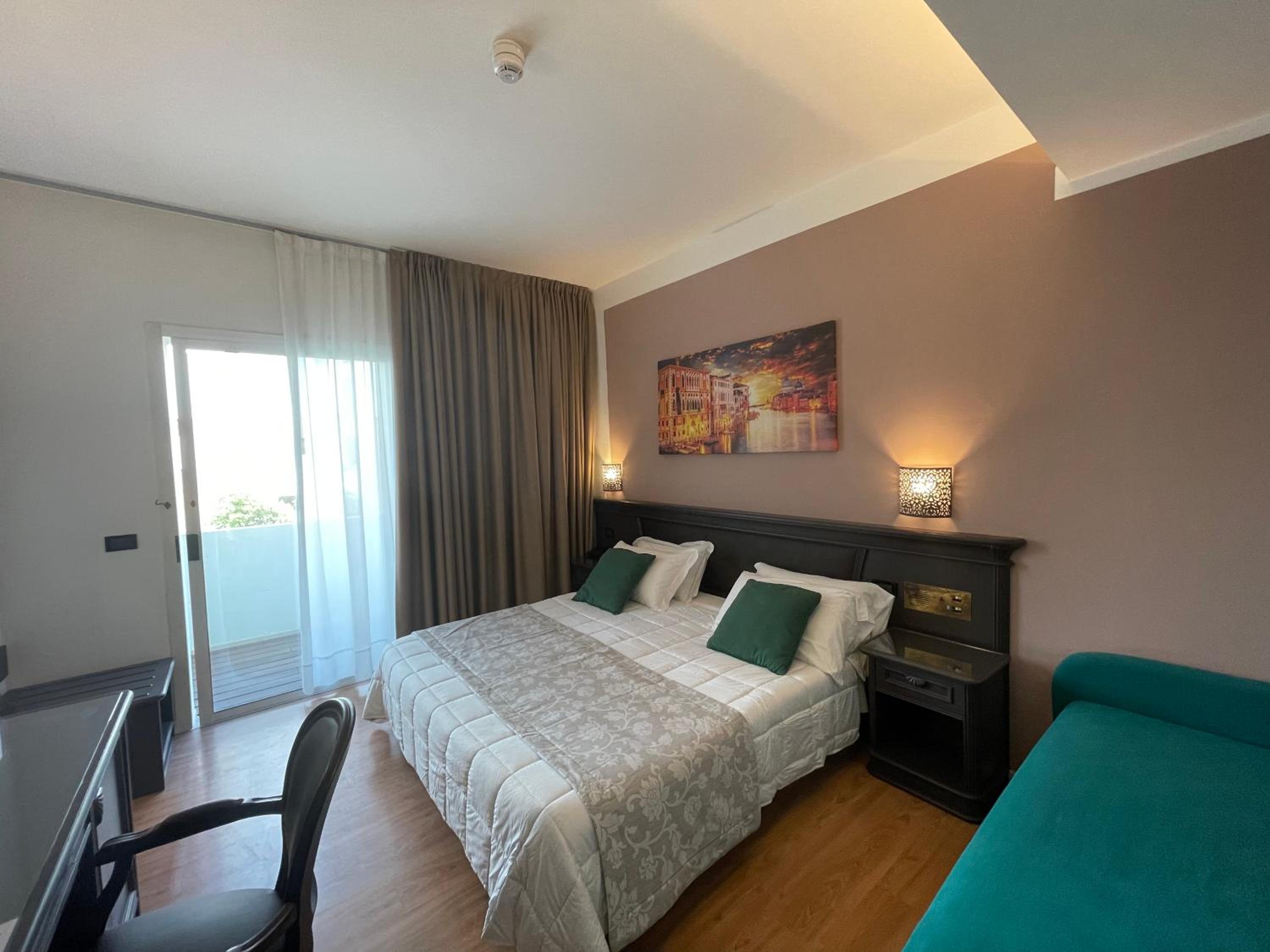 Quadruple Room with Balcony