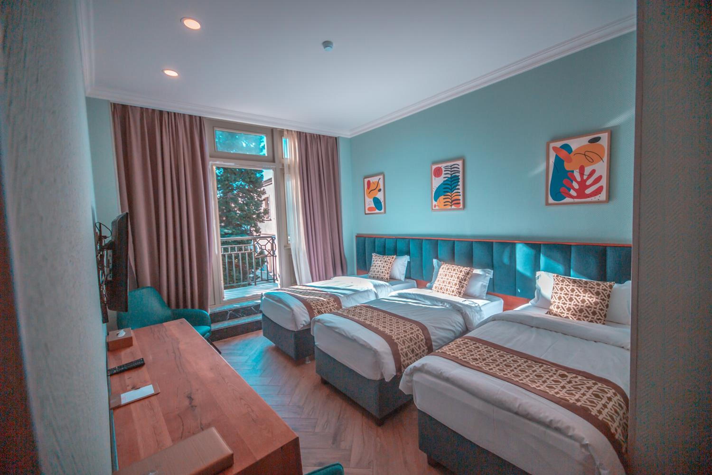 Triple Room with Balcony