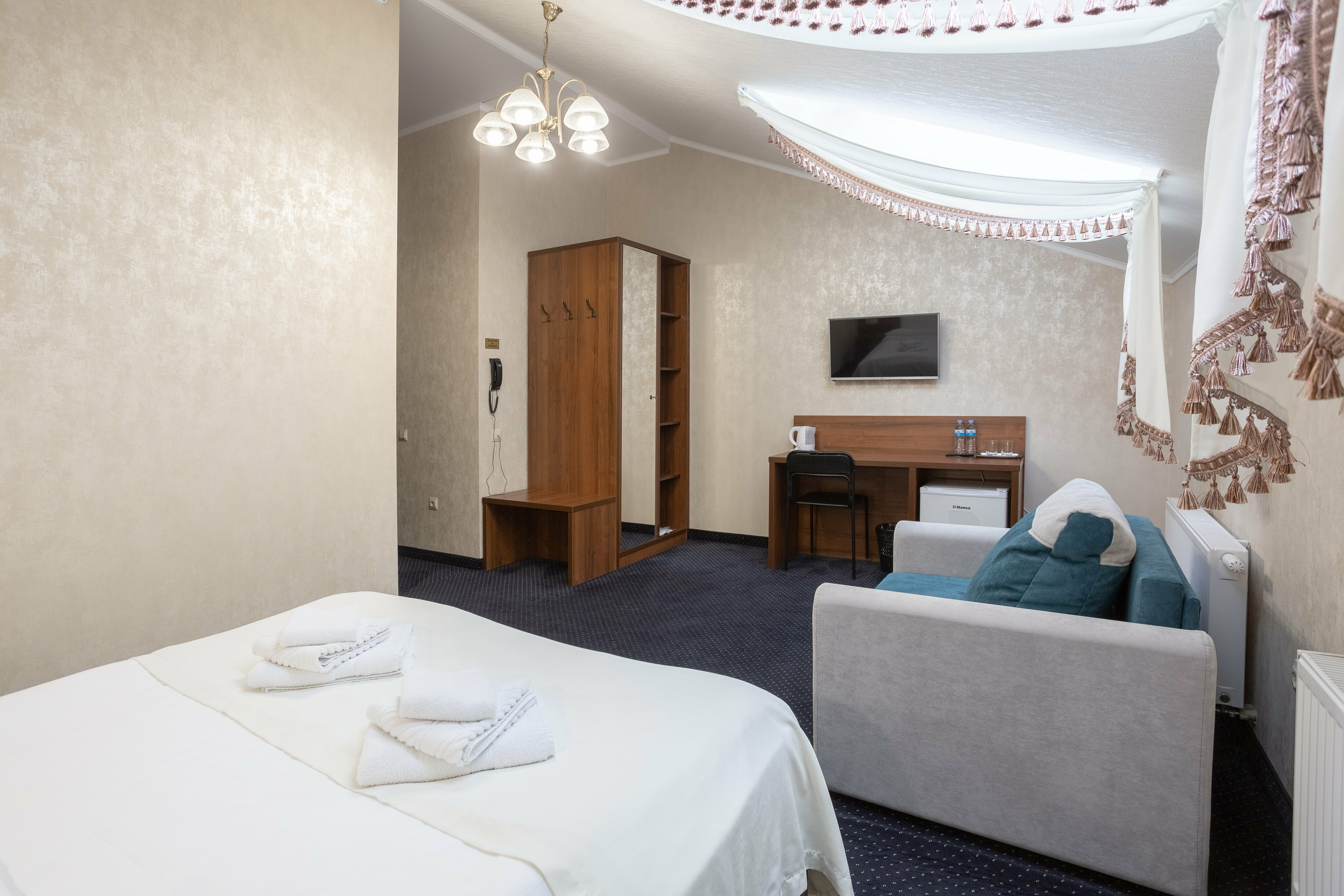 Трехместный номер Делюкс