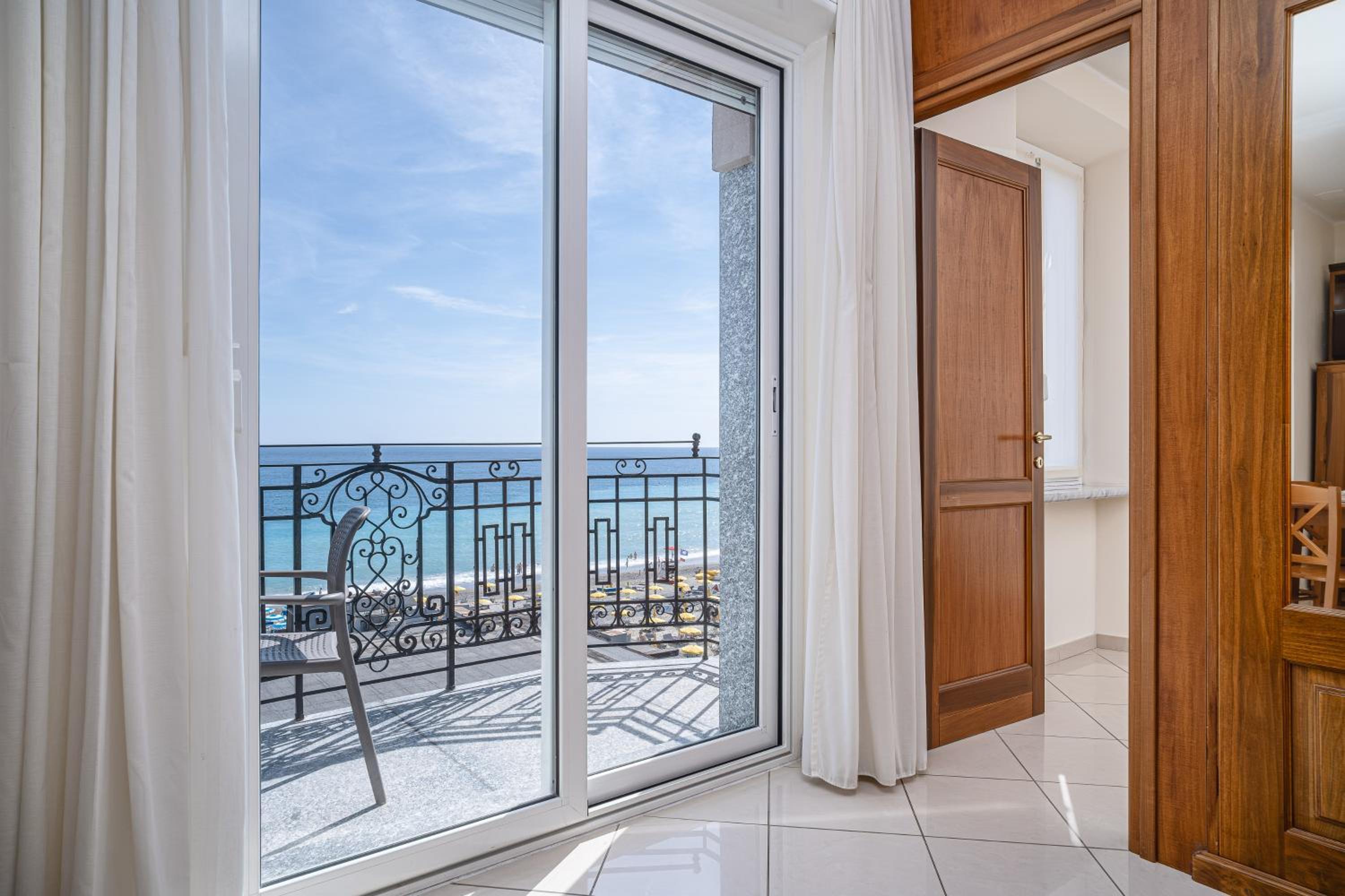 One-Bedroom Apartment with Balcony and Sea View