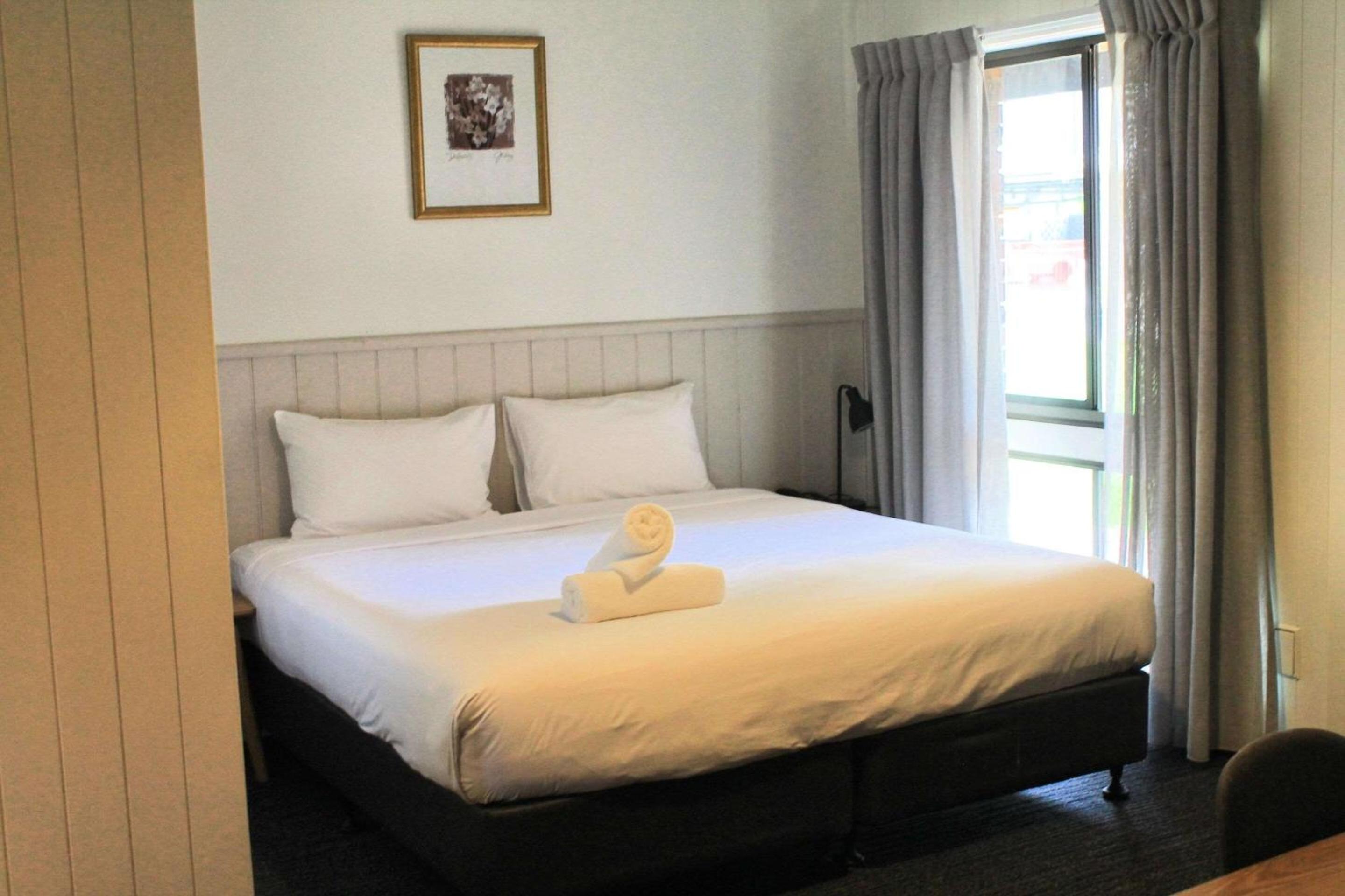 Courtyard Family Room (One King and Two Single Beds)