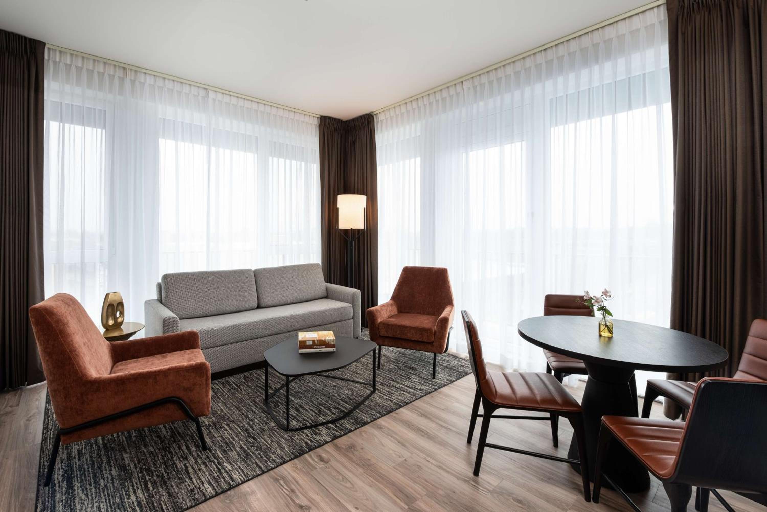 Corner Queen Studio Suite with Balcony