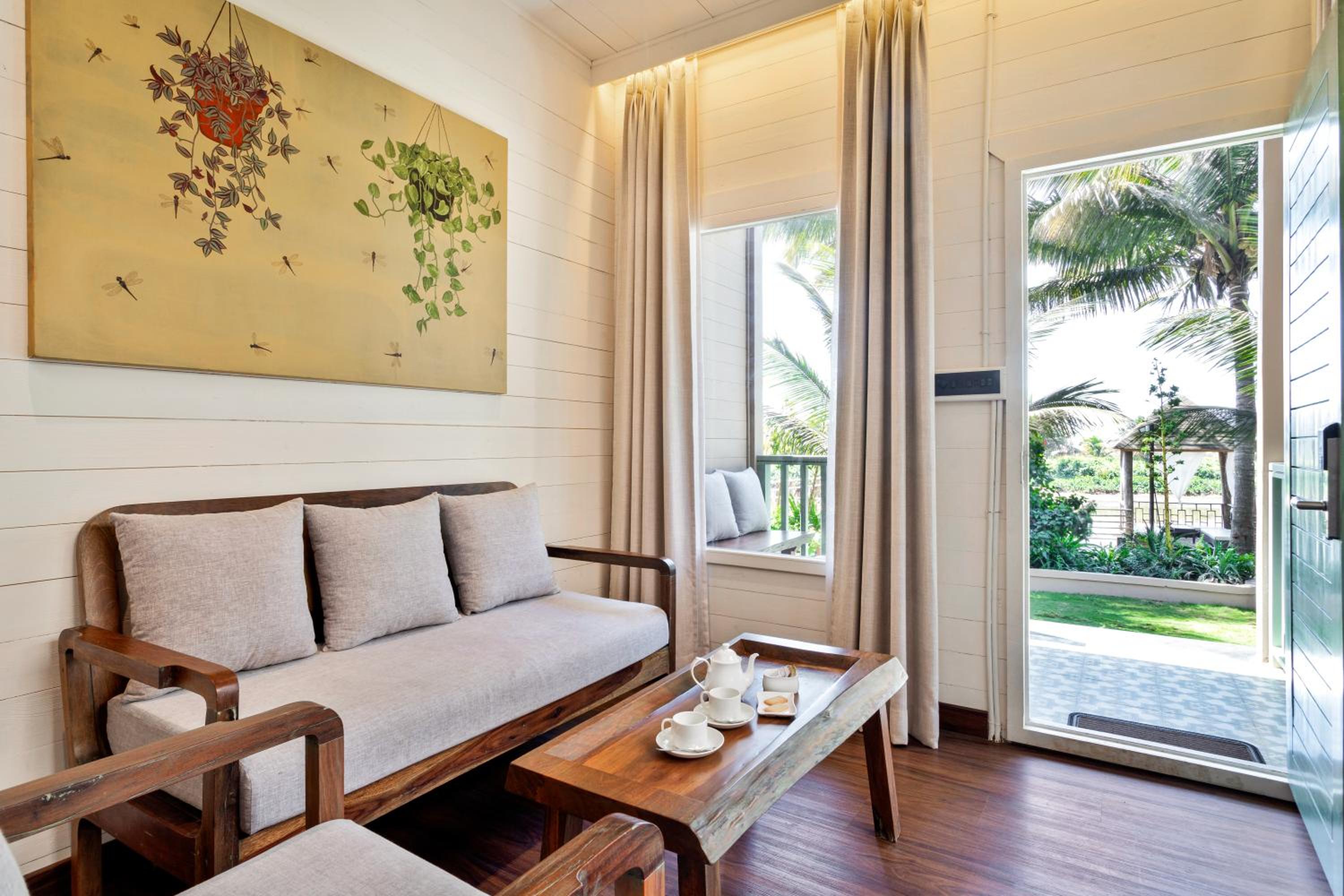 Premium River View Cottage with Balcony (with complimentary Kayaking and 20% off on Massage session)