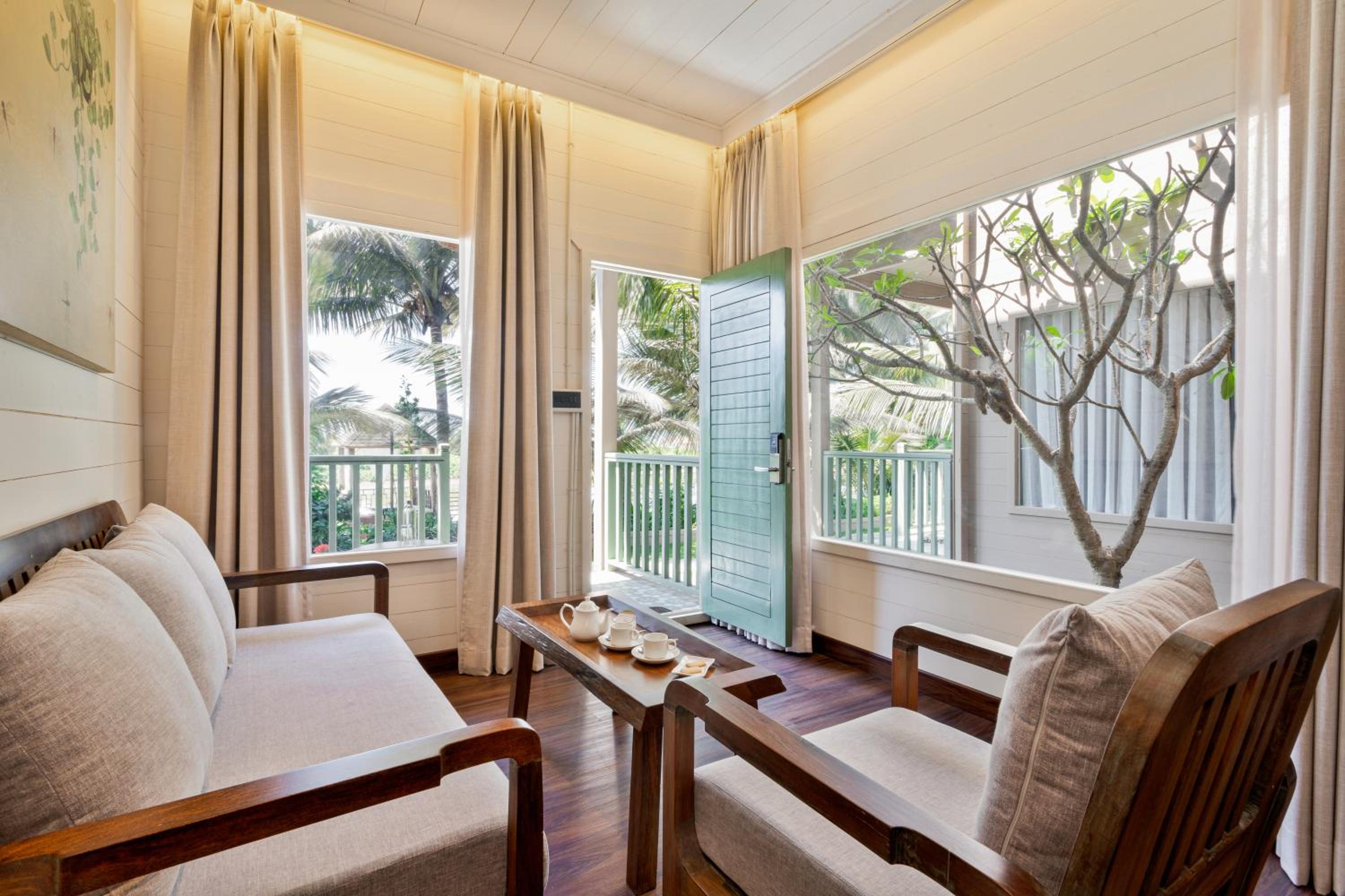 Premium River View Cottage with Balcony (with complimentary Kayaking and 20% off on Massage session)