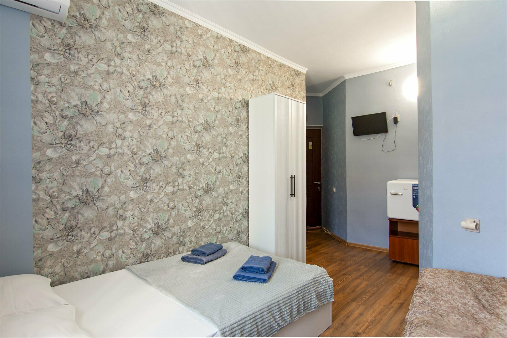 Трехместный номер с видом на сад