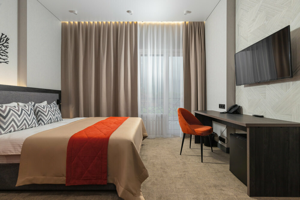 Стандартный  двухместный номер с 1 кроватью или 2 отдельными кроватями и балконом с видом на горы