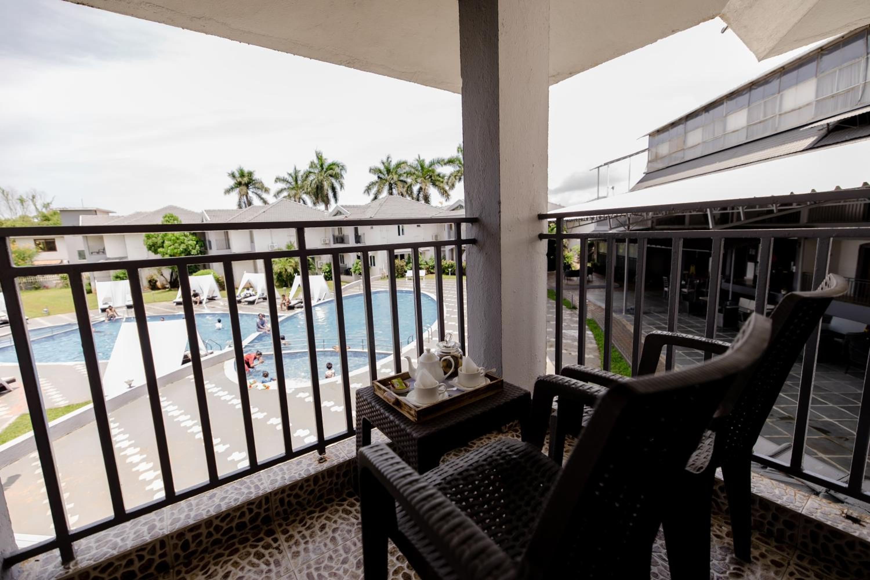 Luxury  Pool View Suite with living room & balcony	
