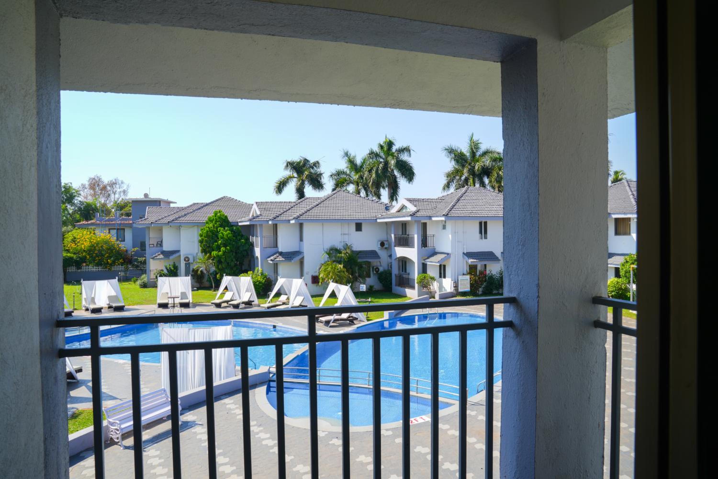 Luxury  Pool View Suite with living room & balcony	