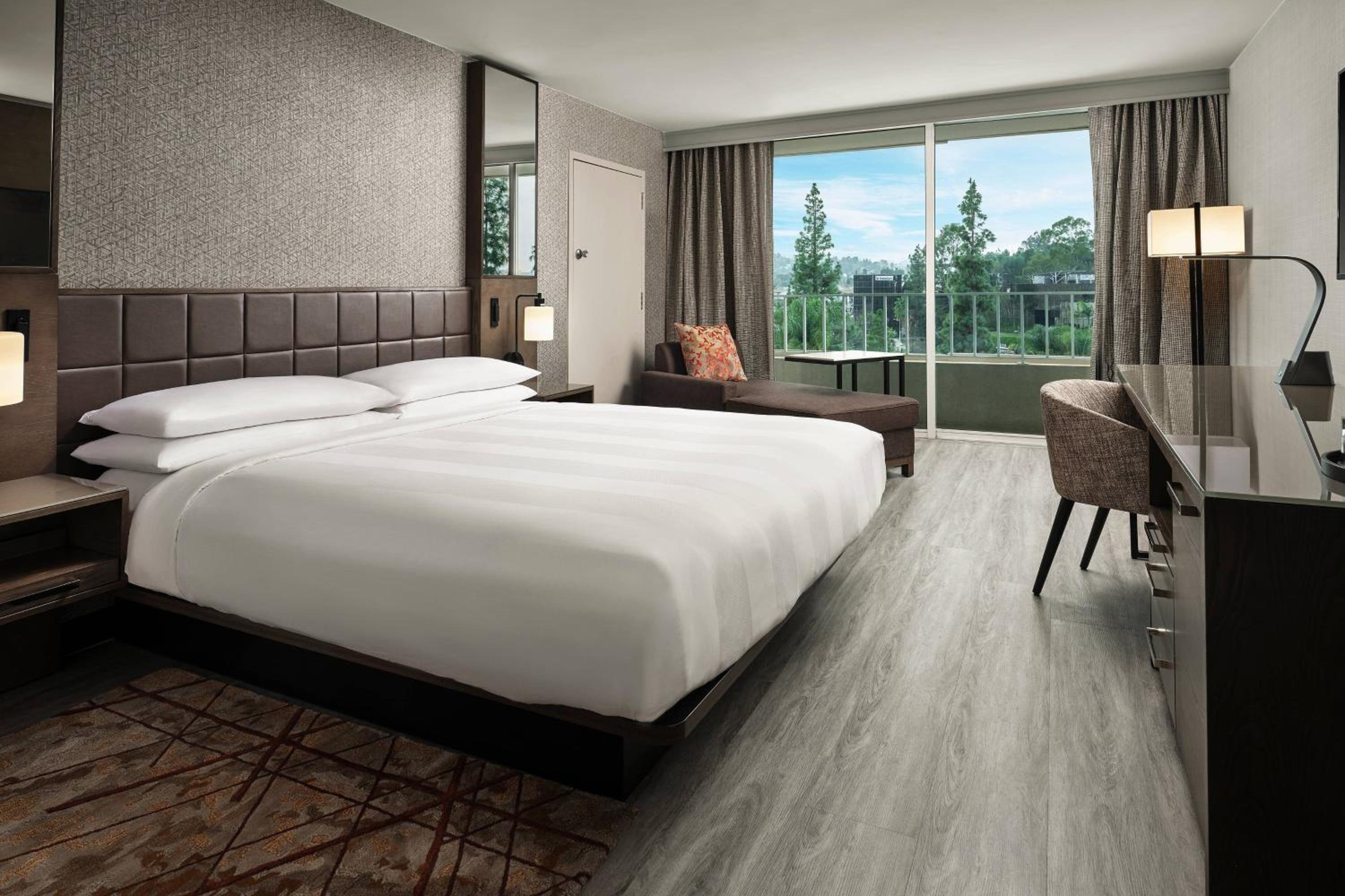 Ideal King Room with Balcony - Mobility Accessible with Roll-In Shower
