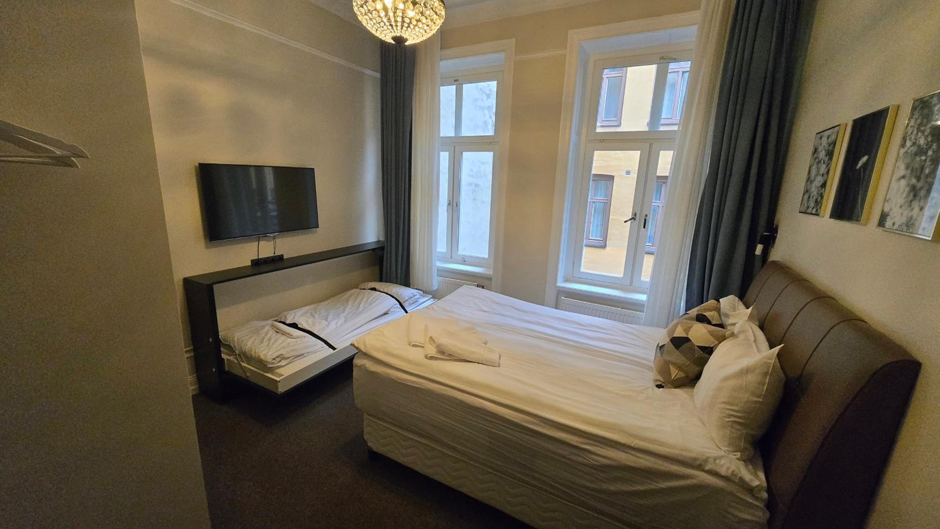 Economy Family Room with Queen Bed and Wall Bed - Non-Smoking