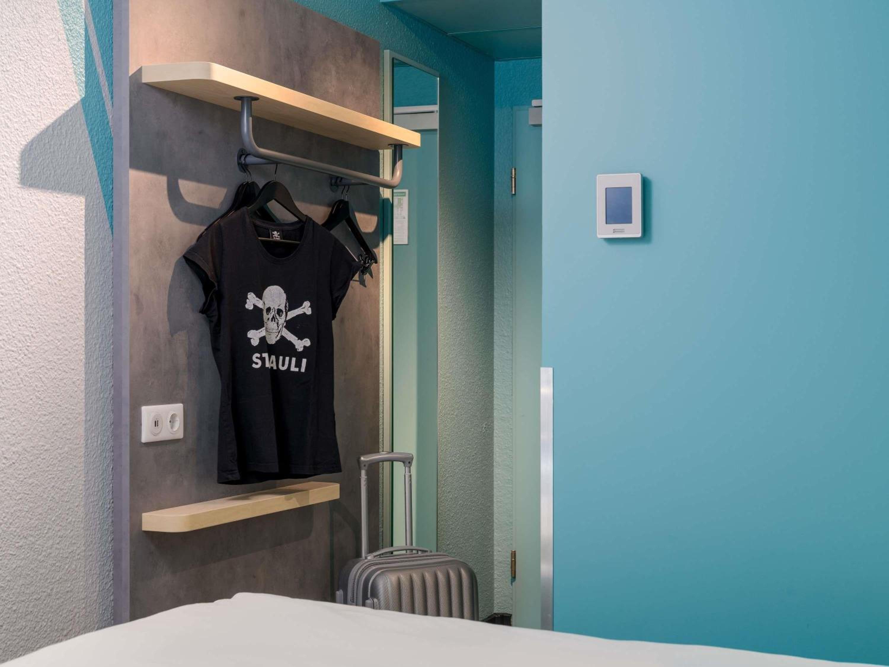 Small twin room with private bathroom and toilet