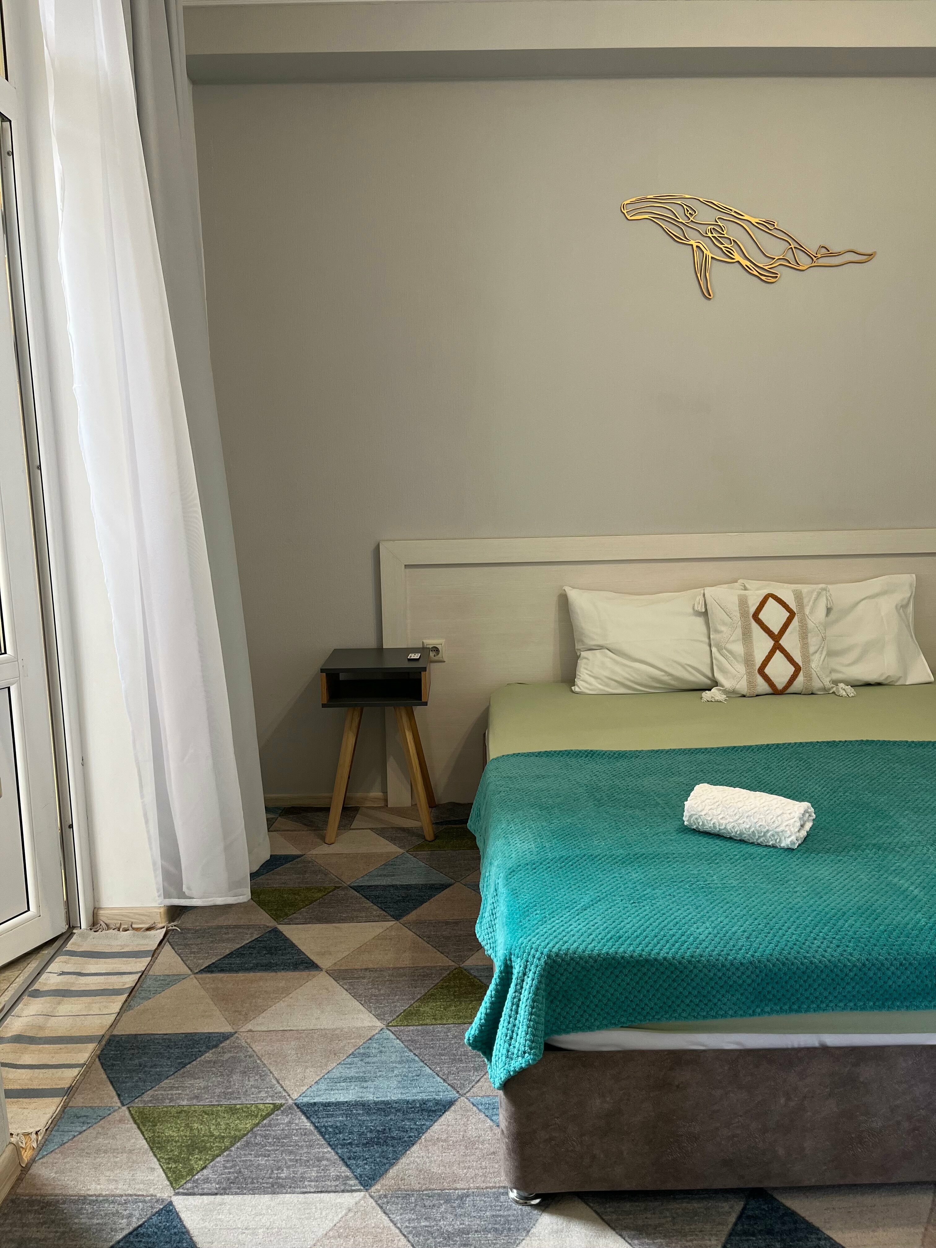 Улучшенный номер с кроватью "King-size" или двумя отдельными кроватями и доп. местом