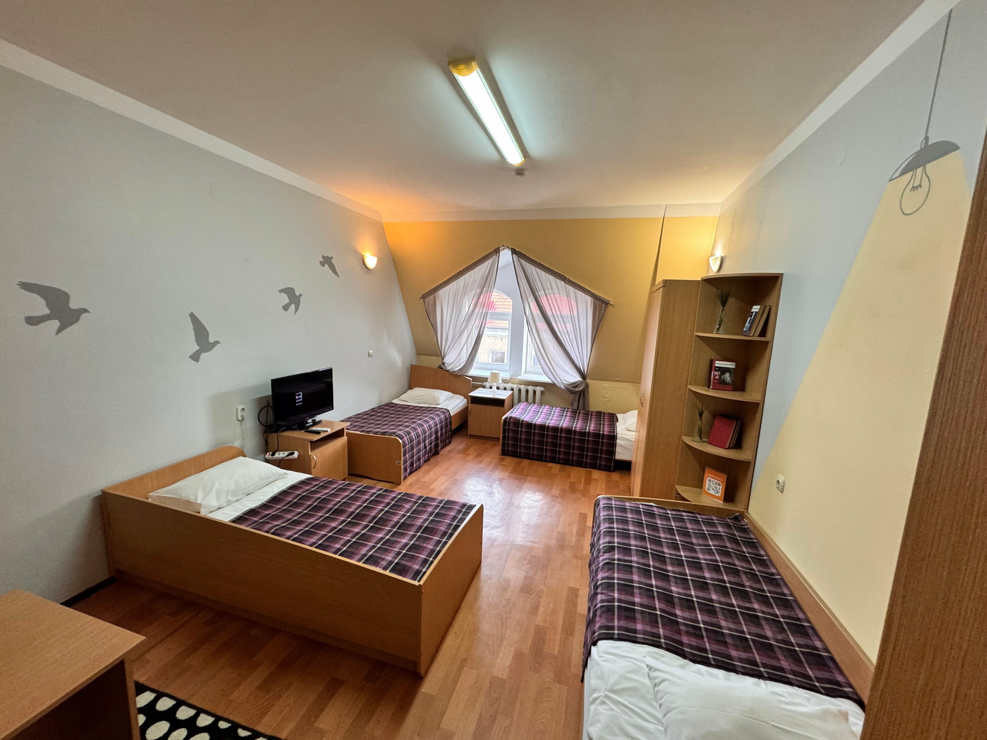 Кровать в общем номере для женщин с 4 кроватями