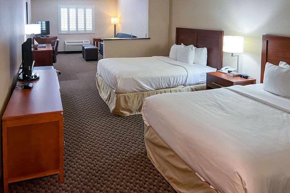 Suite, 2 Queen Beds, 2 TV's, Sitting Area, Sofa Bed, Wet BAR, Non-Smoking