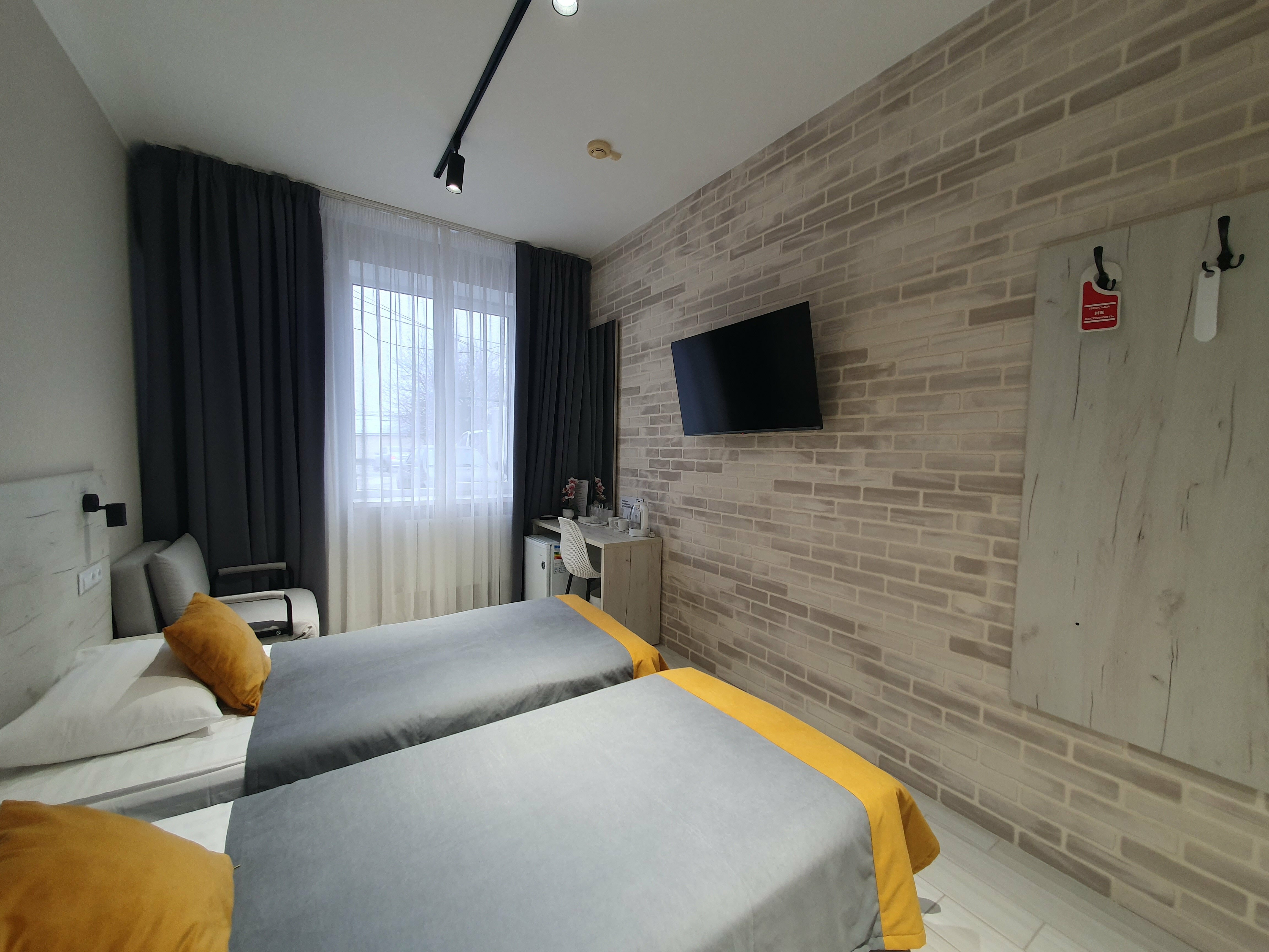 Улучшенный двухместный номер с 2 отдельными кроватями