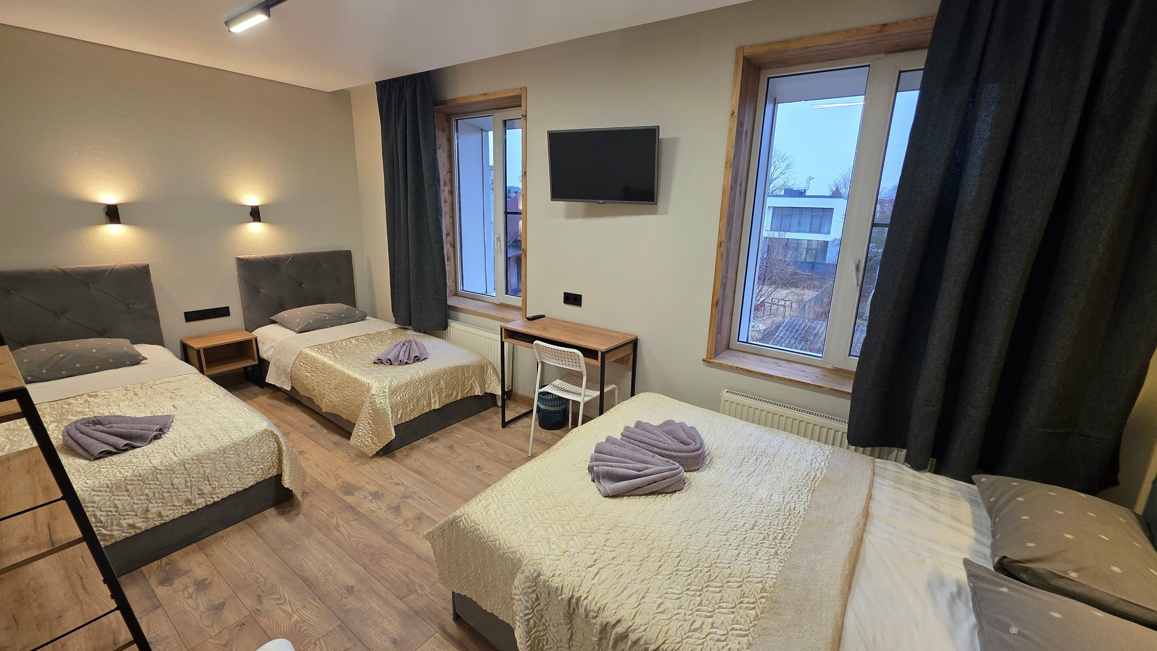 Семейный номер с общей ванной комнатой