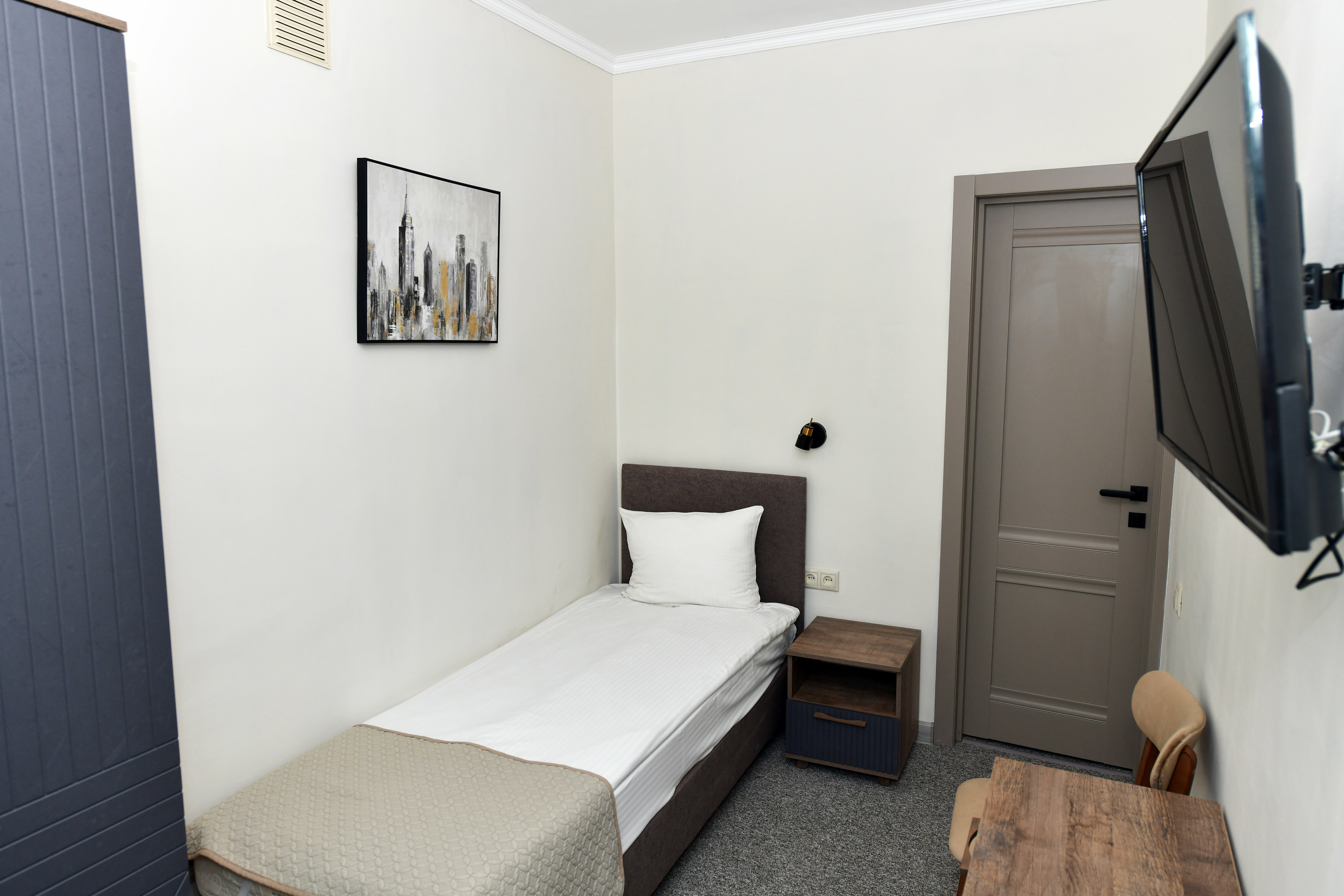 Одноместный номер с общим душем и туалетом