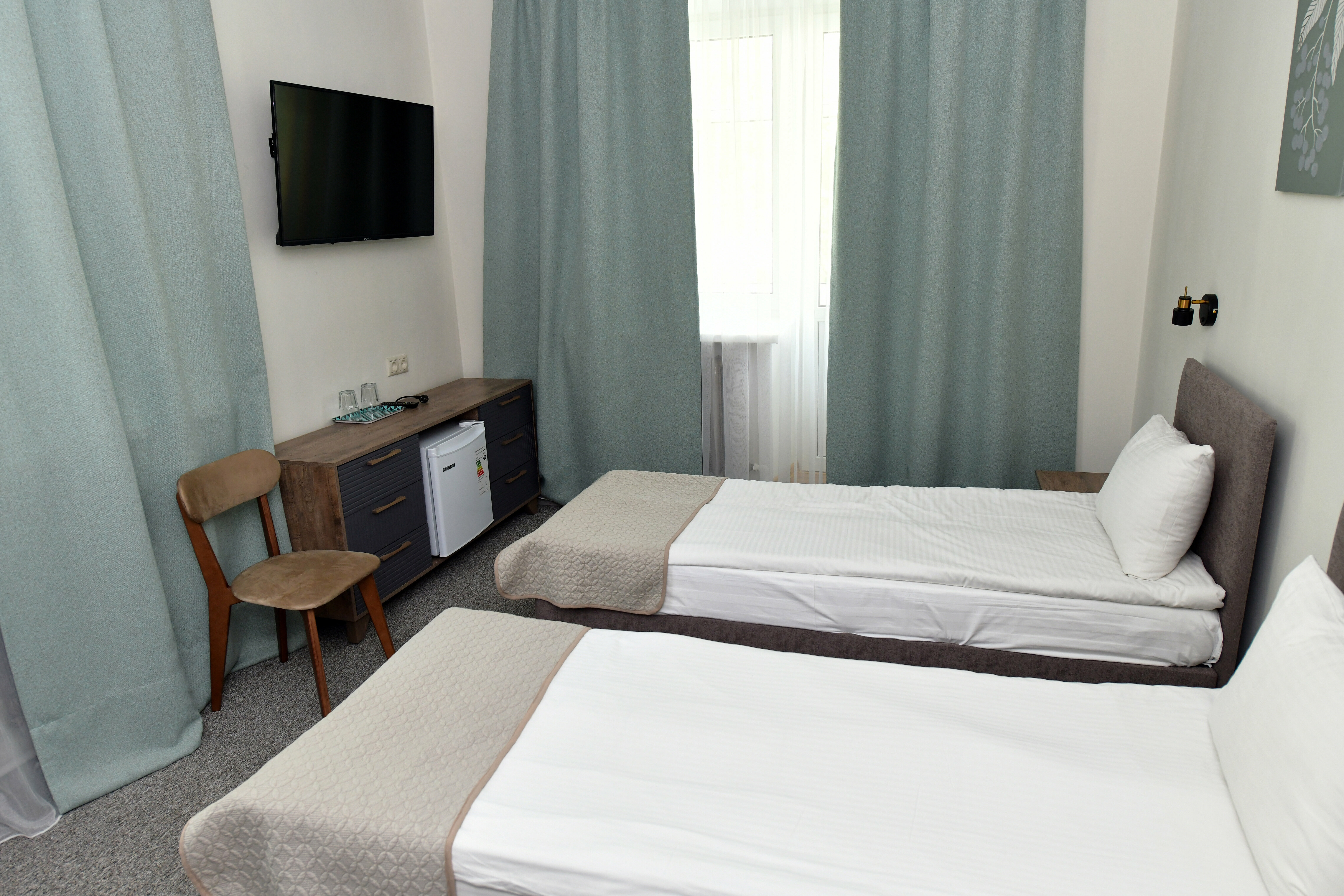 Двухместный номер с 1 кроватью или 2 отдельными кроватями и общей ванной комнатой