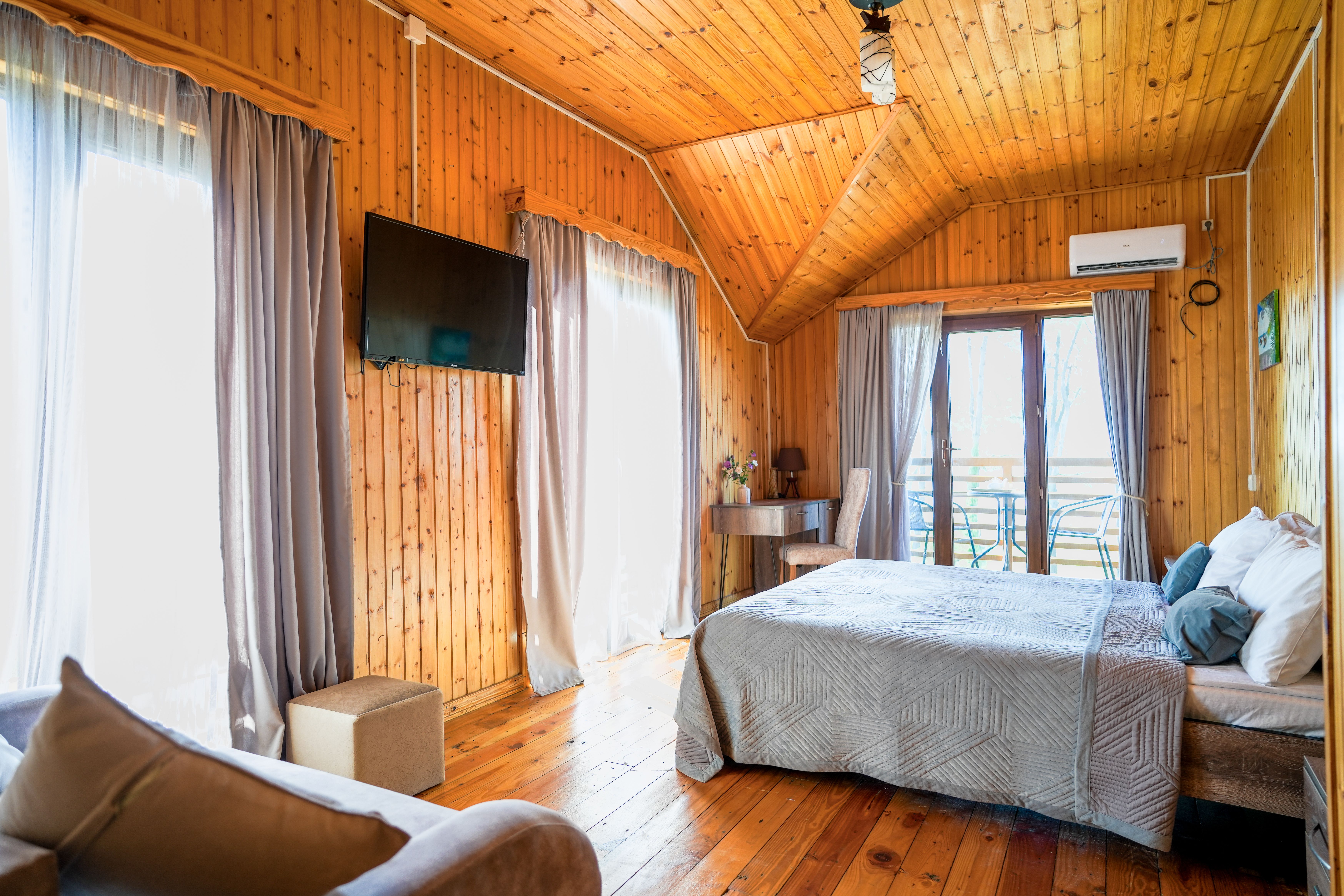 Трехместный номер Делюкс