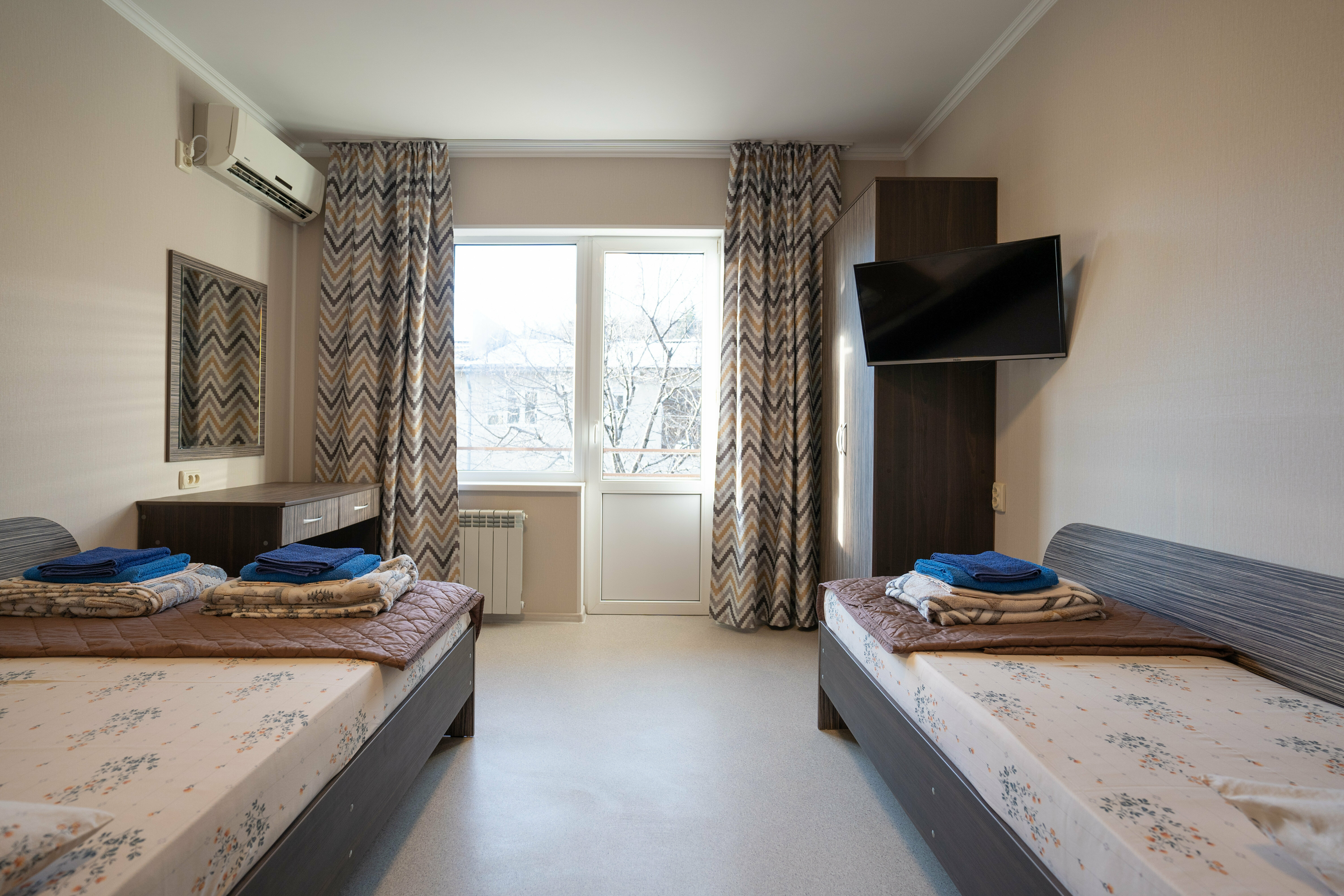 Трехместный номер с балконом