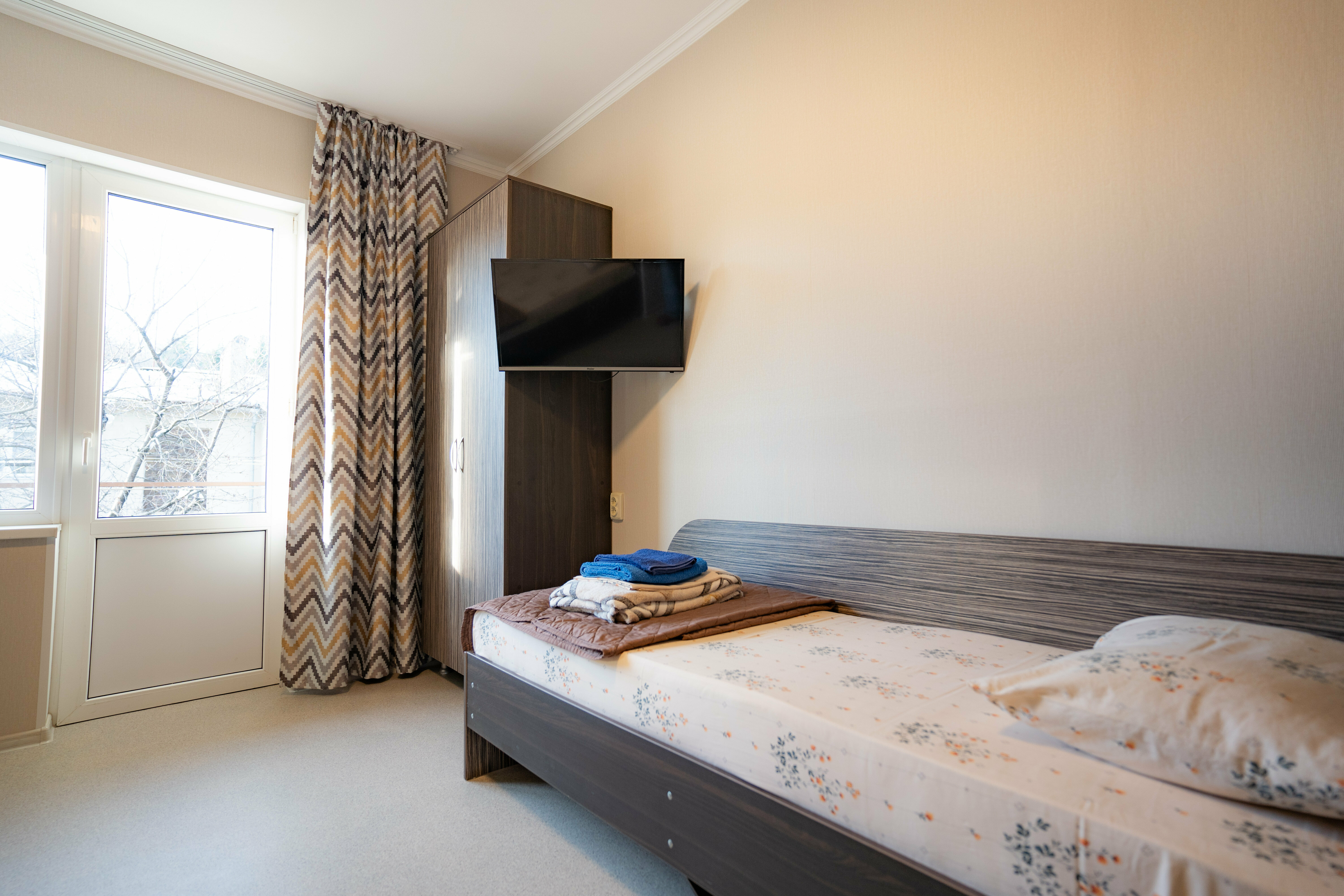 Трехместный номер с балконом