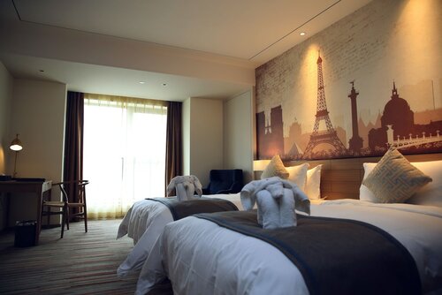 Улучшенный двухместный номер с 2 односпальными кроватями в Prolit Hotel Cheng Du